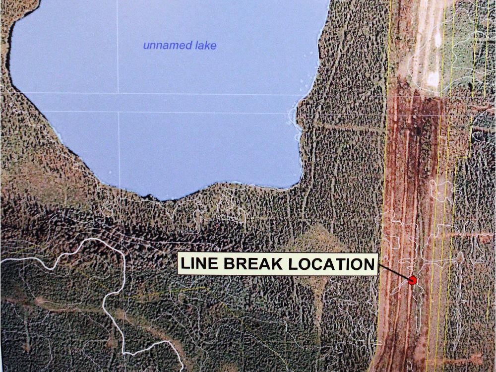 Nexen Photograph/ Calgary Herald CALGARY, AB -- JULY 17, 2015 -- A photograph showing the pipeline spill was on display as Nexen Senior Vice-President, Canadian Operations Ron Bailey provided an update regarding the pipeline failure near Nexen's Long Lake facility during a press conference on July 17, 2015. (Nexen Photograph/Calgary Herald) (For City story by Dan Healing) 00067028A SLUG: 0718-Pipeline