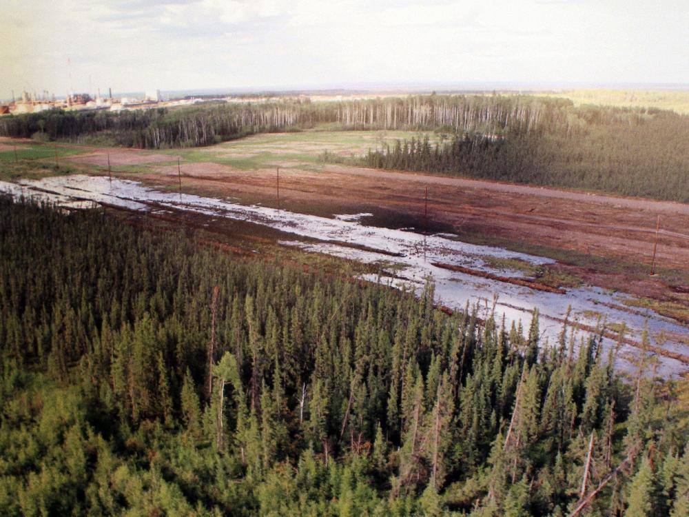 Nexen Photograph/ Calgary Herald CALGARY, AB -- JULY 17, 2015 -- A photograph showing the pipeline spill was on display as Nexen Senior Vice-President, Canadian Operations Ron Bailey provided an update regarding the pipeline failure near Nexen's Long Lake facility during a press conference on July 17, 2015. (Nexen Photograph/Calgary Herald) (For City story by Dan Healing) 00067028A SLUG: 0718-Pipeline